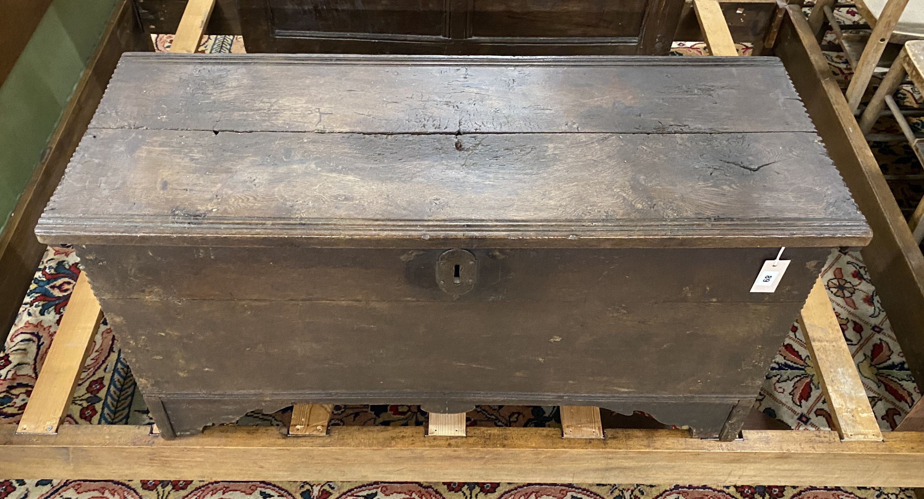 An 18th century oak coffer, length 111cm, depth 43cm, height 56cm